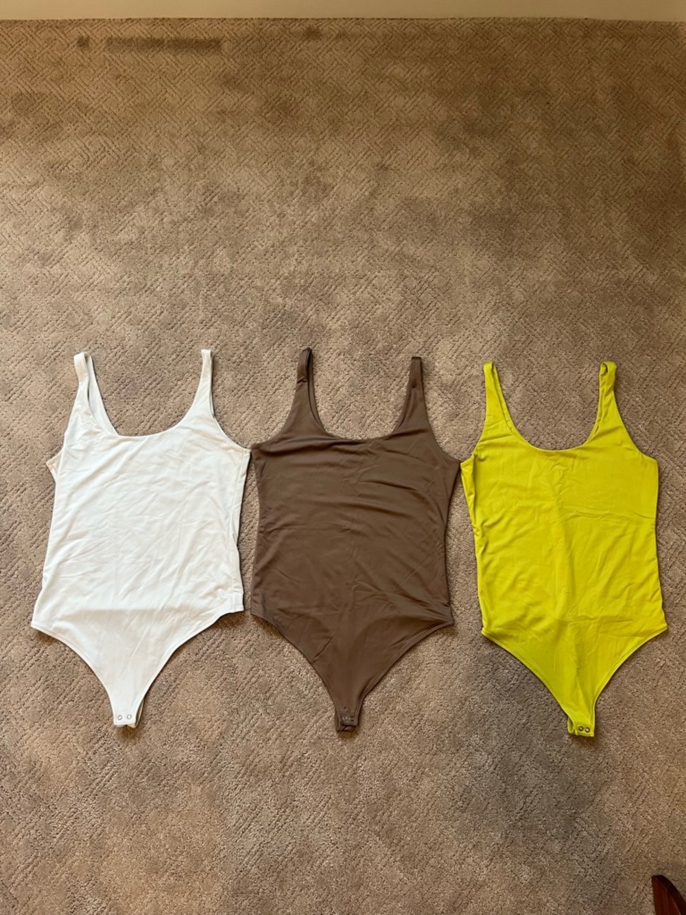 Abercrombie & Fitch Soft A&F Bodysuits in White, Brown, and Yellow